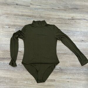 NWOT mangopop collection green turtle neck body suit. Incredibly comfy material